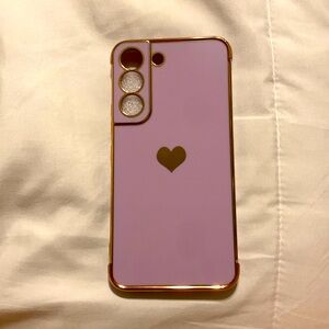 Samsung Galaxy S22 purple and gold Amazon phone case.